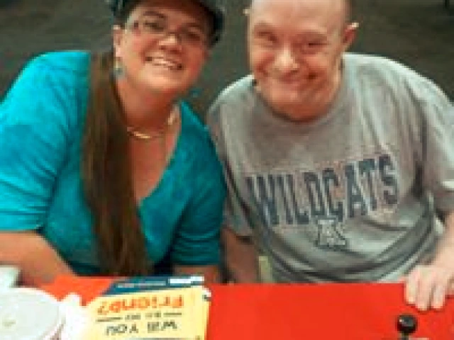 Marianne Joey, who was diagnosed with Down Syndrome and his sister as a caregiver.