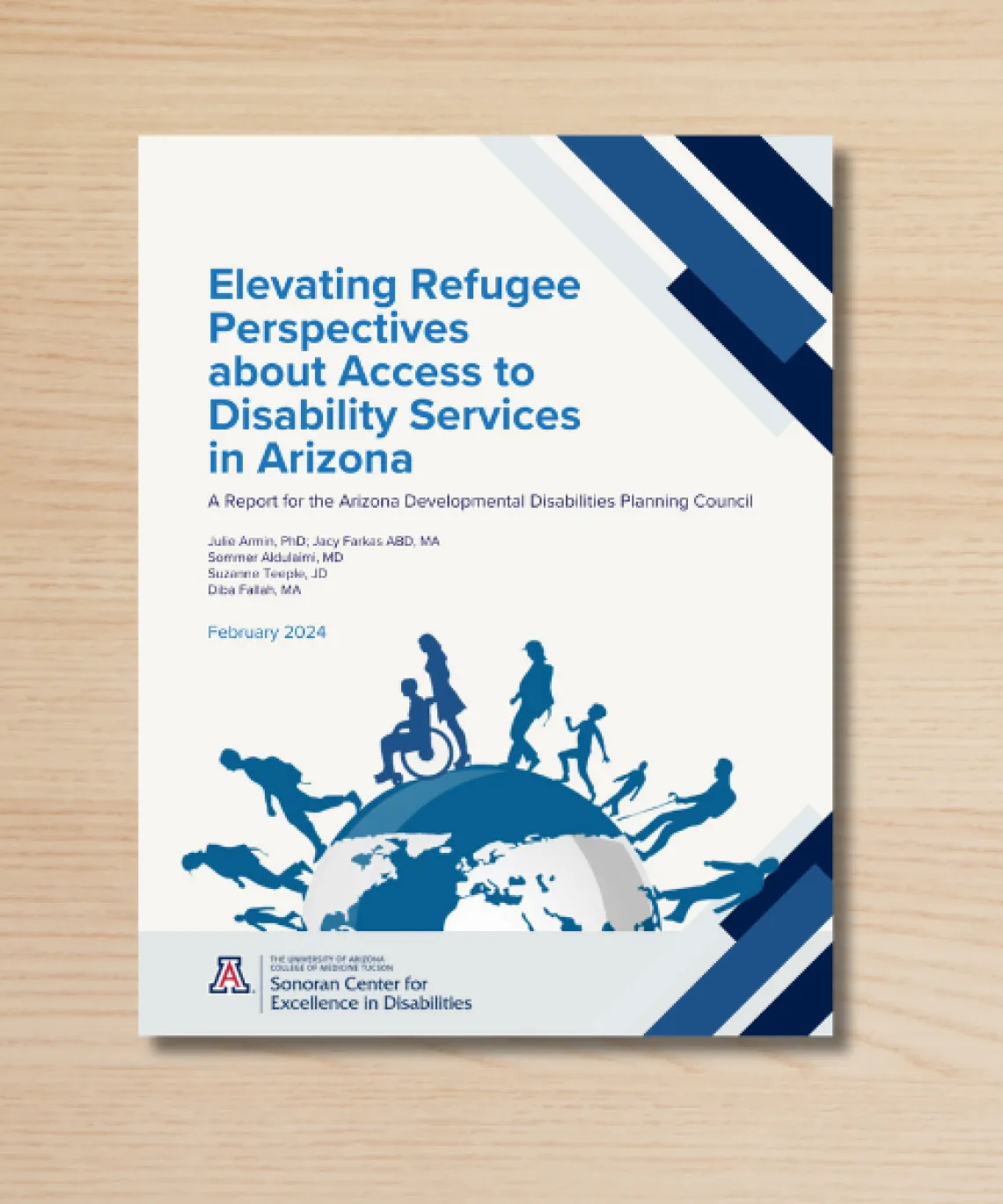 Report sitting on a wooden desktop.