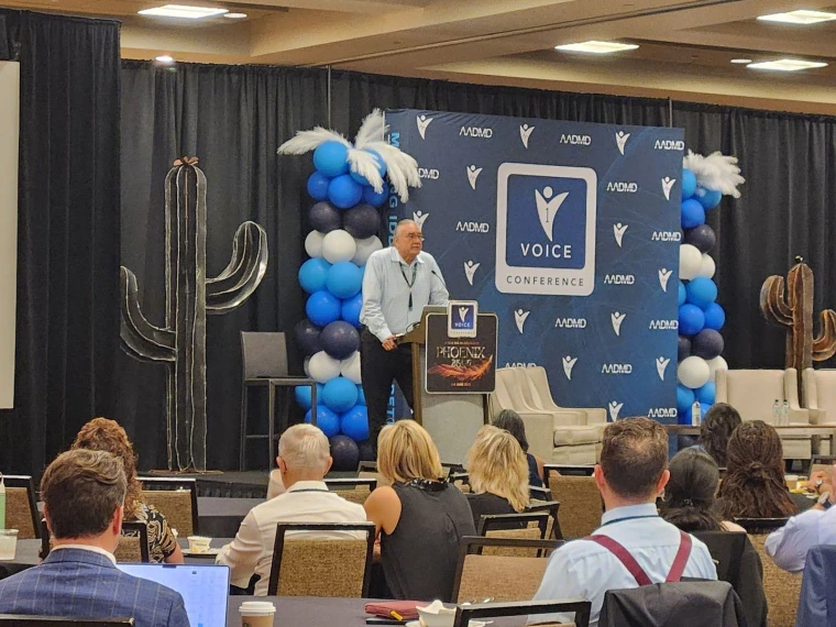 Another angle of Jim Warne presenting at the AADMD One Voice Conference.