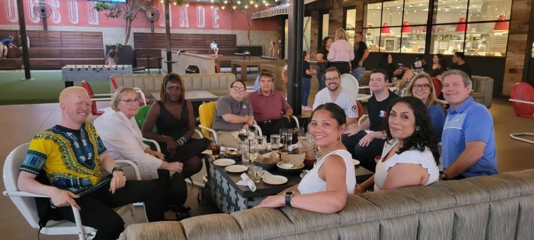 Group photo of Mai and Kelvin's farewell dinner party