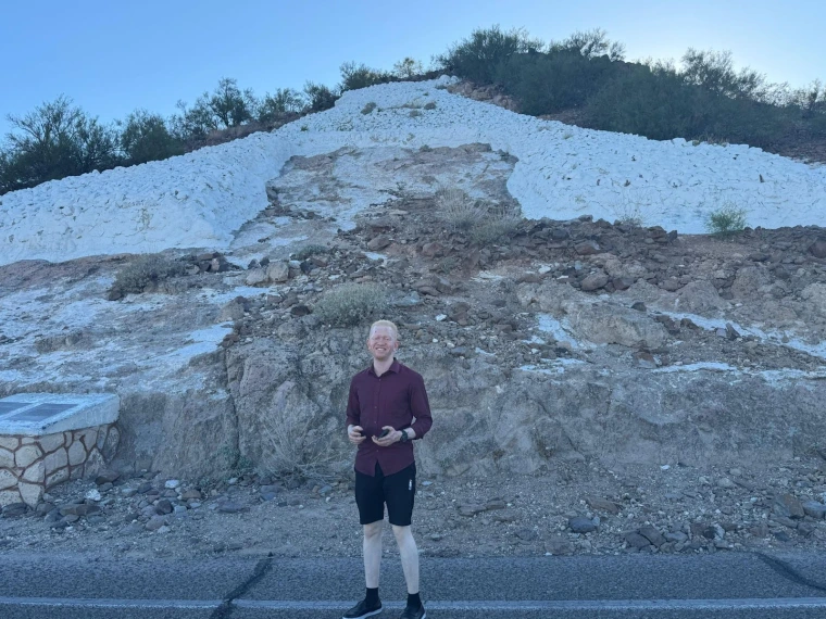 Kelvin smiles in front of ‘A’ Mountain A.